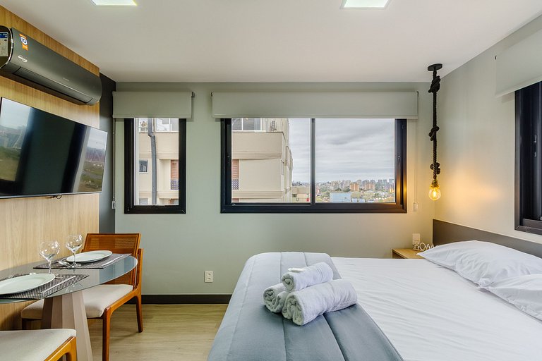 Novíssimo flat decorado com vista! - 1102B