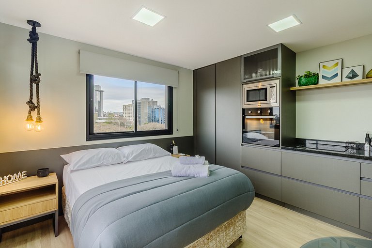 Novíssimo flat decorado com vista! - 1102B